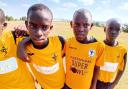 Julian Chenery has helped to get old Fakenham Town FC shirts across Africa to support children - This photo was taking at the Talents Academy in Uganda