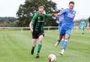 Wells Town Res in action against Feltwell United