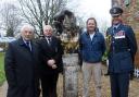 From left, former West Raynham station commander, Ed Durham; Ken Delve, chair of Trustees Veterans Central; sculptor, Drew Edwards; and RAF Marham station commander, group captain Fred Wigglesworth; with the sculpture at the West Raynham SHQ