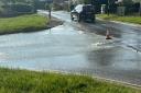 A Saxmundham road is flooded after a water main burst