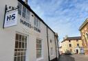A Fakenham law firm has relocated just a minute's walk away from its previous location.