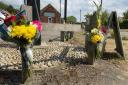 Floral tributes were left in North Elmham, near Dereham, following the death of a biker in his 20s