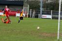 Ashley Jarvis puts Fakenham Town in front on Saturday. Picture: TONY MILES