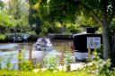 Boating in the sunshine near the River Yare in Brundall