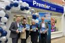Paul Waters managing director at Premier Travel, two members of staff of Fakenham's Premier Travel and Peter Ryan from Celebrity Cruises at the shops opening