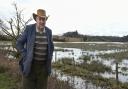 Peter Howell, a Norfolk cattle farmer whose grazing land alongside the River Wensum has been flooded since Christmas
