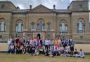 The Dereham Ukraine Aid Centre organised a trip to Holkham Hall for 85 Ukrainians