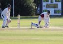 Fakenham's Chad Bowes, reverse sweeping, on his way to a century. Picture: RONNIE HEYHOE