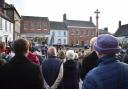 People gathered at a Remembrance service in Fakenham