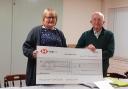The cheque was presented to Clarissa Belson, manager of First Focus by Fakenham Auto Club chairman Brian Monks