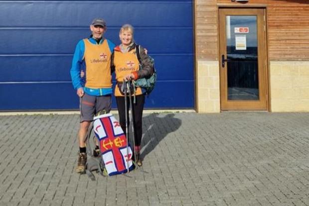 A couple walking the UK coastline have visited Wells lifeboat station