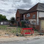 The plot at Norwich Road, in Fakenham, revised proposals have been submitted could see the road and footpath widened
