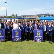 Alderman Peel Senior Leadership Team and students celebrating after they were awarded a 'Good' mark following its Ofsted inspection