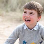 Prince Louis enjoy a day out on Holkham Beach in this adorable photo taken by his mother.