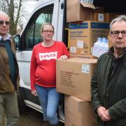 Martin Jensen (left) with his daughter Emily Jensen-Balderstone and fellow Guestwick villager Rupert Wood, with the urgent medical supplies which they will deliver to the Ukraine border