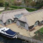 The Norfolk Broads property has a thatched roof.