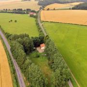 Fancy living in the middle of nowhere? This old bungalow is for sale in countryside close to one of Norfolk's most expensive locations.