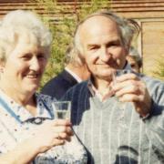 Norfolk agricultural industry figure Jim Davidson has died aged 93. Here he is pictured with his wife Isabel raising a glass at a garden party