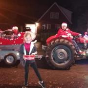 Carpenter David Vardigans along with Phoebe Vardigans and Nigel Curson took to the streets of Fakenham in one of his classic tractors to spread joy this Christmas.