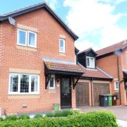 The three-bedroom link-detached modern family home on The Lawn in Fakenham