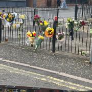 The floral tributes were left in Cattle Market Street, Fakenham, following the death of Braden-Lee Payne near the junction with Bridge Street