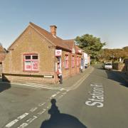 An arrest has been made after a man armed with a crowbar stole cash from a post office in Wells