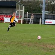 Ashley Jarvis puts Fakenham Town in front on Saturday. Picture: TONY MILES