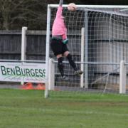 Sam Garner lobs the Long Melford keeper to score in Fakenham Town's weekend win. Picture: TONY MILES