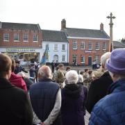 People gathered at a Remembrance service in Fakenham