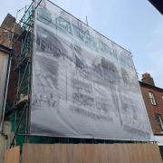 9 Norwich Street is going under a building wrap, with the cover set to be finished on March 24