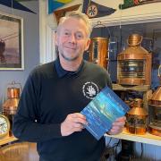 Wells harbourmaster Robert Smith with his new book, Doctor at Sea